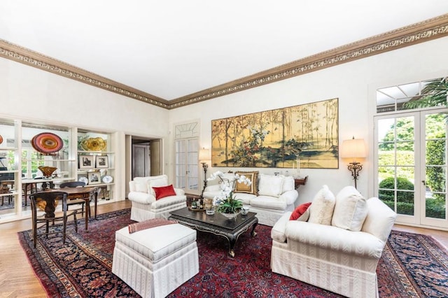 living room featuring ornamental molding and french doors