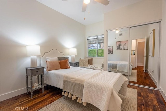 bedroom with dark wood-type flooring and ceiling fan