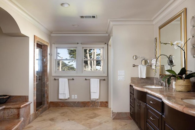 bathroom featuring vanity, ornamental molding, and walk in shower