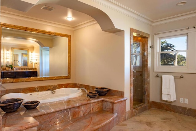 bathroom with vanity, ornamental molding, and separate shower and tub