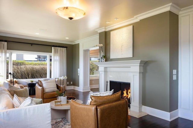 living room featuring a high end fireplace, a wealth of natural light, and dark hardwood / wood-style floors