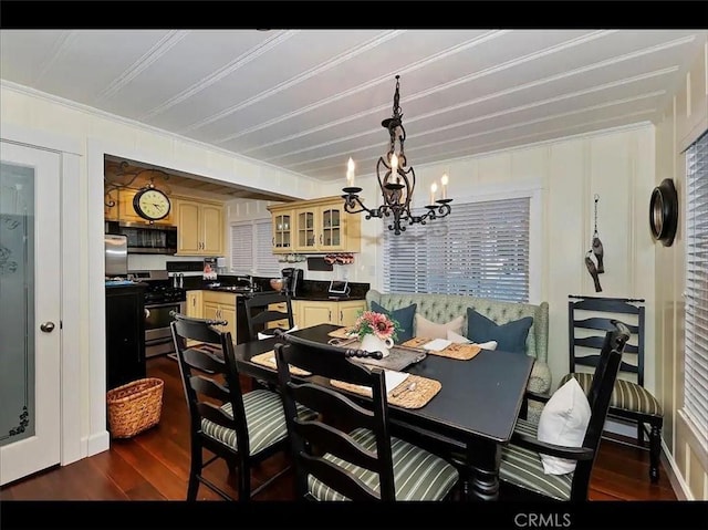 855 Lake Dr, Lake Arrowhead, CA 92352 - dining space featuring dark wood-style floors, a chandelier, and crown molding