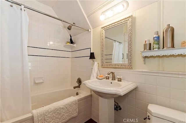 855 Lake Dr, Lake Arrowhead, CA 92352 - bathroom with tile walls, shower / bath combo with shower curtain, and toilet