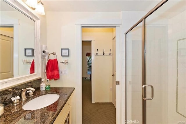 bathroom featuring vanity and walk in shower