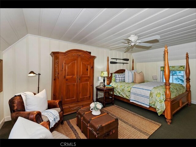 855 Lake Dr, Lake Arrowhead, CA 92352 - carpeted bedroom with a decorative wall, lofted ceiling, and ceiling fan