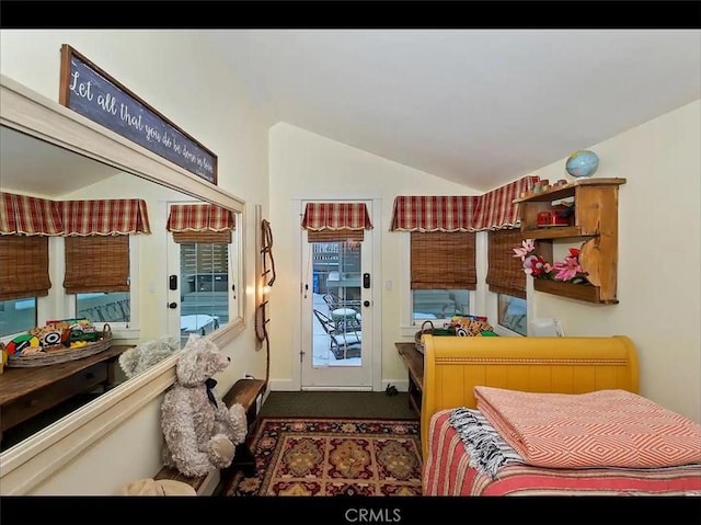 855 Lake Dr, Lake Arrowhead, CA 92352 - bedroom with access to exterior, lofted ceiling, dark carpet, and baseboards