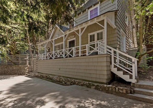 view of property exterior with a patio