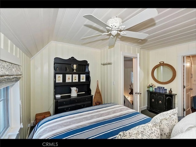 bedroom featuring vaulted ceiling and ceiling fan