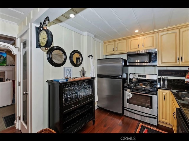 855 Lake Dr, Lake Arrowhead, CA 92352 - kitchen with appliances with stainless steel finishes, dark wood-type flooring, light brown cabinets, ornamental molding, and recessed lighting