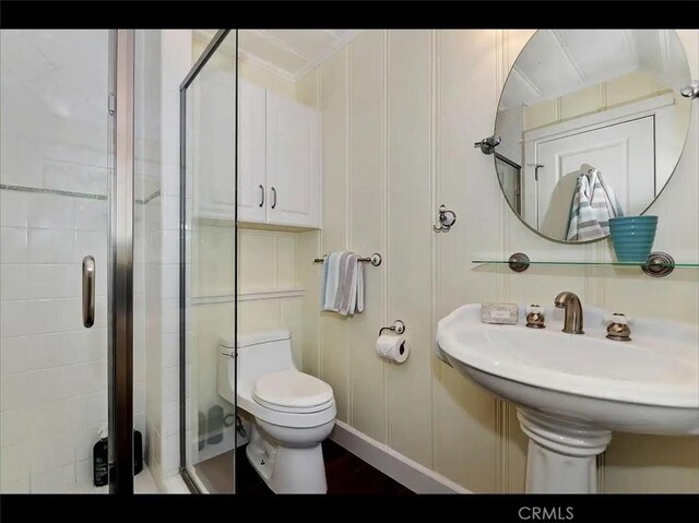 855 Lake Dr, Lake Arrowhead, CA 92352 - bathroom featuring a shower stall, toilet, and wood finished floors