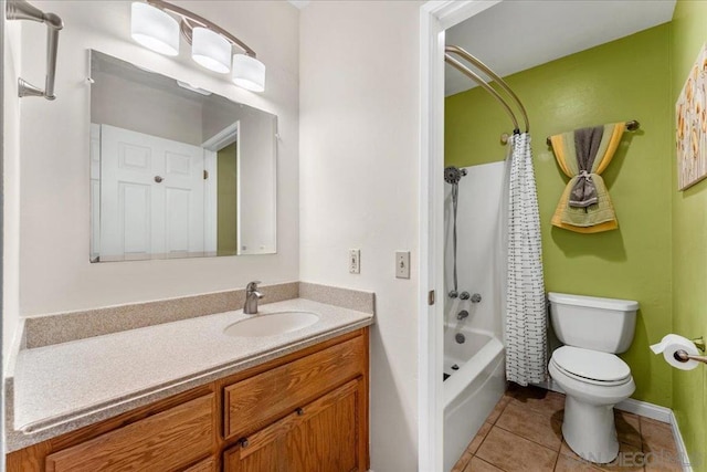 full bathroom featuring vanity, toilet, tile patterned flooring, and shower / bath combo