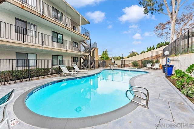 view of pool featuring a patio area