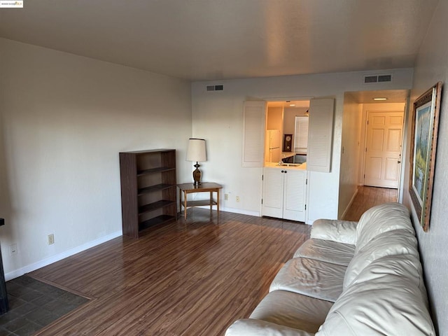 living room featuring dark hardwood / wood-style flooring