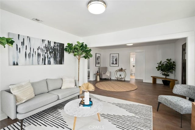 living room with dark wood-type flooring