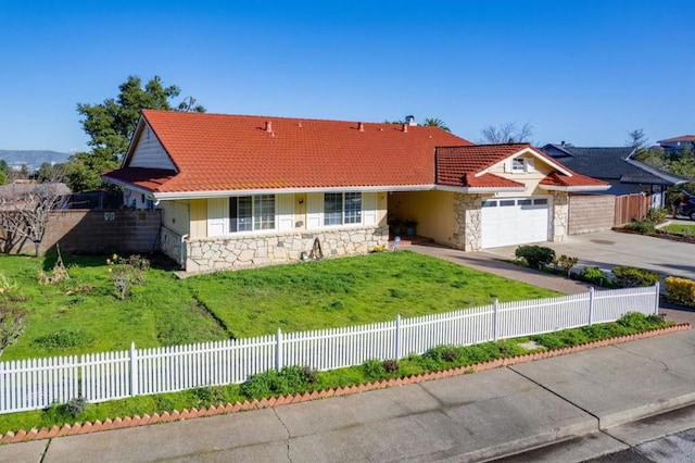 single story home with a garage and a front lawn