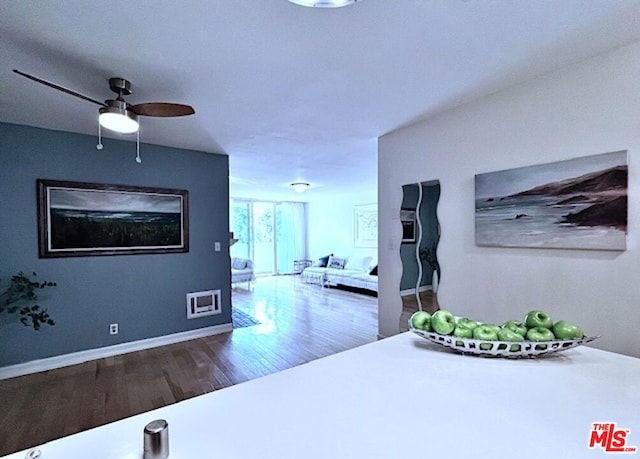 hallway featuring dark hardwood / wood-style flooring