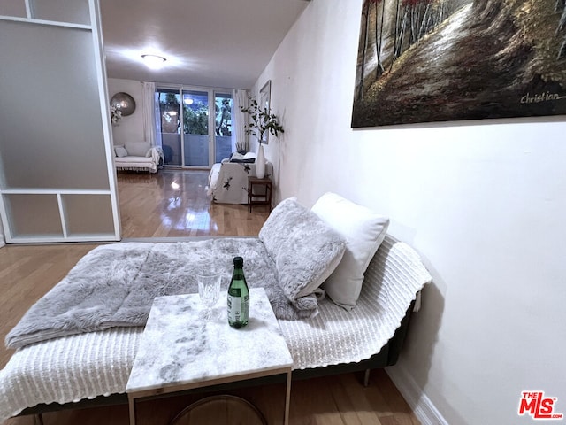 bedroom featuring hardwood / wood-style flooring