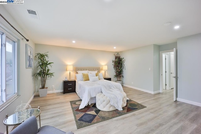 bedroom featuring light wood-type flooring