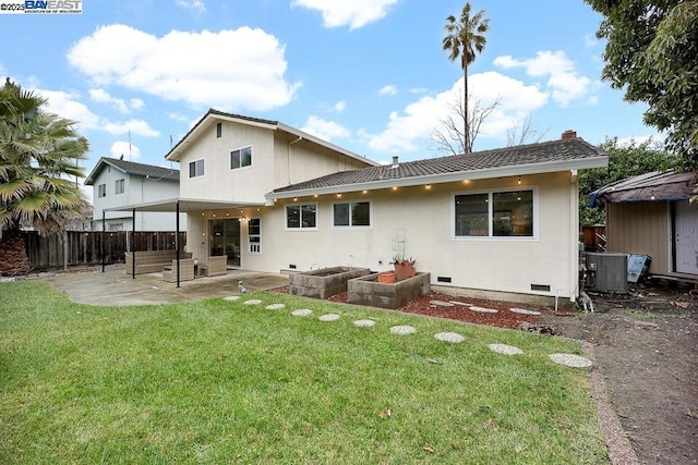 back of property with a patio, a lawn, and central air condition unit