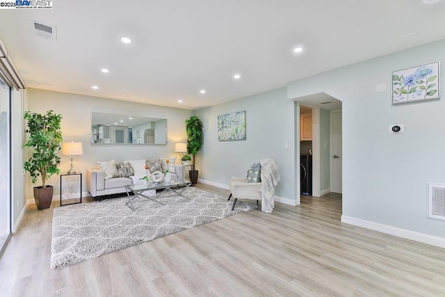 living room featuring light hardwood / wood-style floors