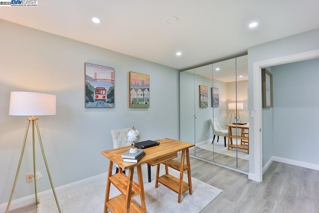 home office featuring light hardwood / wood-style floors