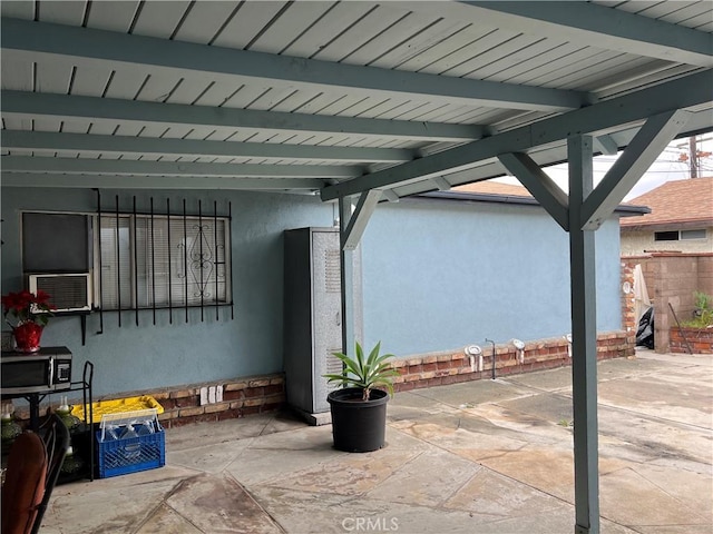 view of patio / terrace featuring cooling unit