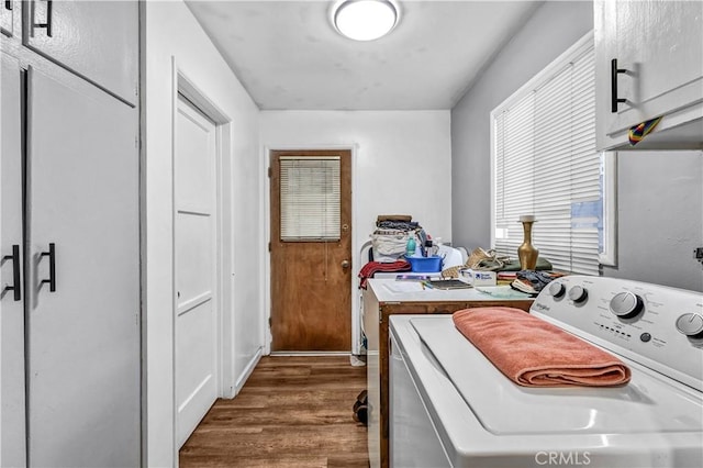 washroom with cabinets and dark hardwood / wood-style floors