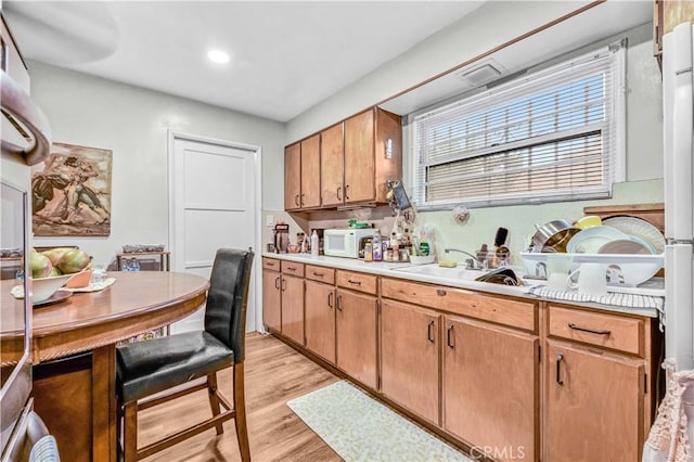 kitchen featuring light hardwood / wood-style flooring