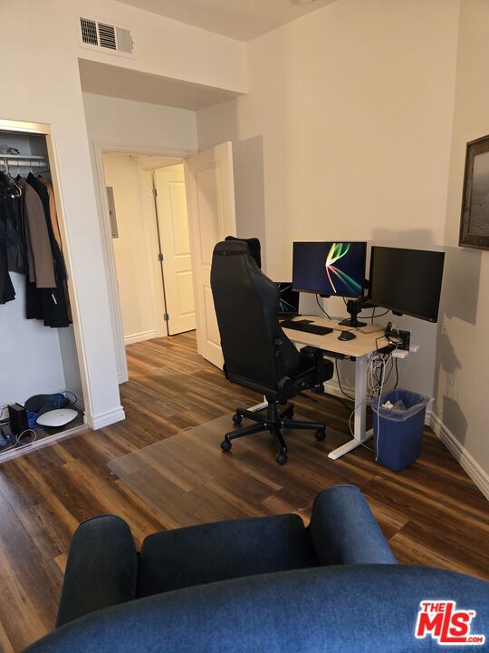 home office featuring dark hardwood / wood-style floors