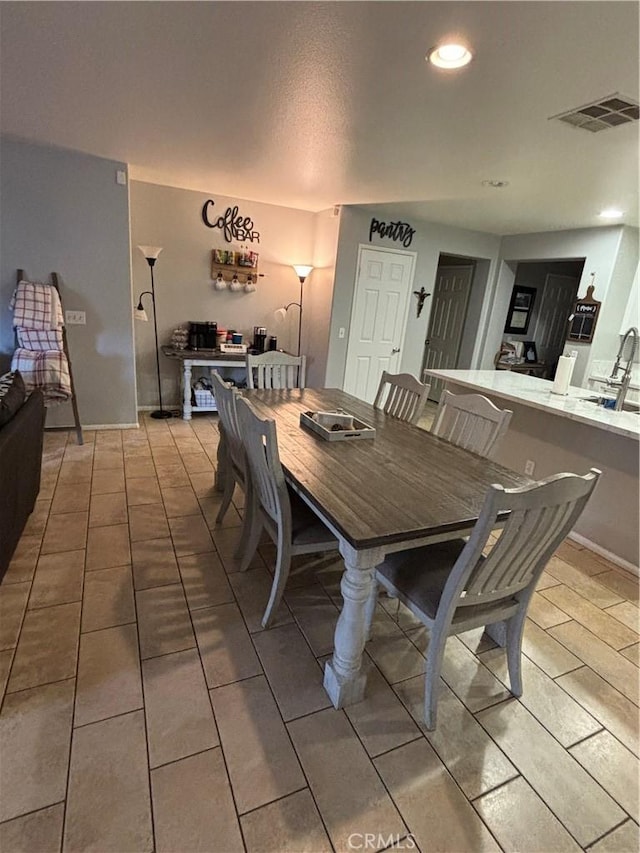 dining space with sink