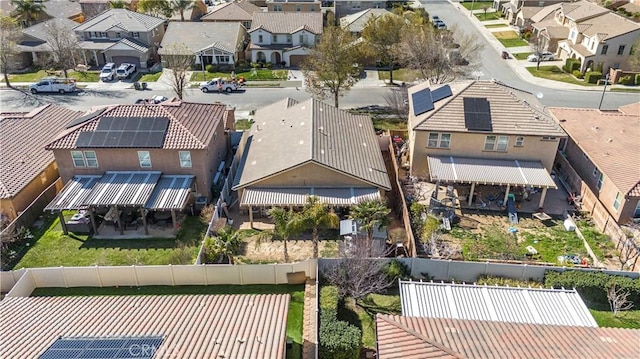 birds eye view of property with a residential view