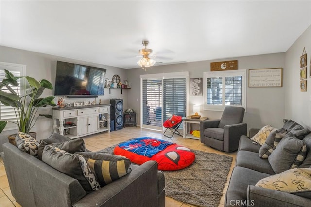 living room featuring a ceiling fan