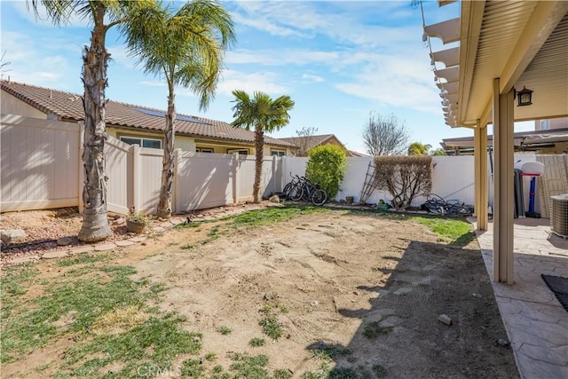 view of yard with a patio and a fenced backyard