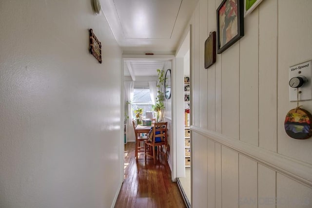 hall with dark hardwood / wood-style flooring