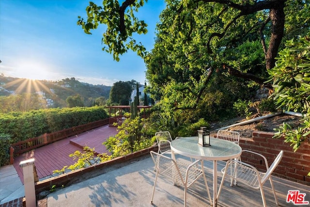 view of patio / terrace featuring a wooden deck