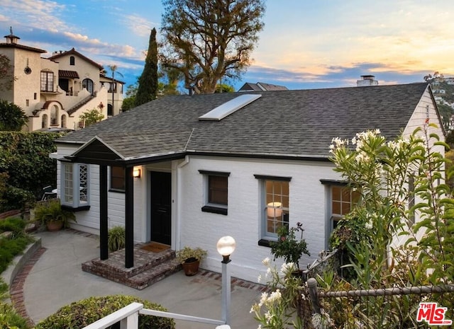 view of front of home featuring a patio area