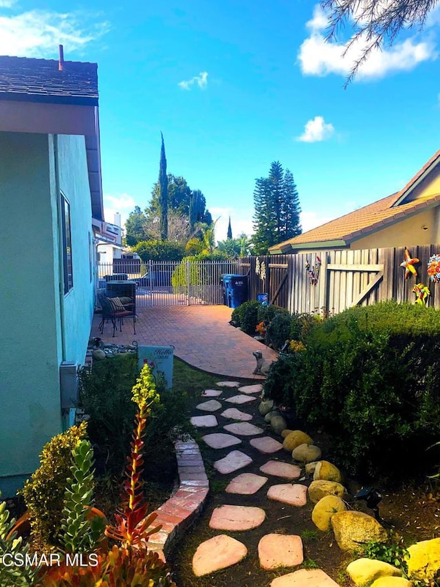 view of yard with a patio area