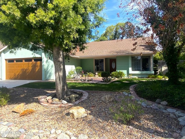 ranch-style home with a garage