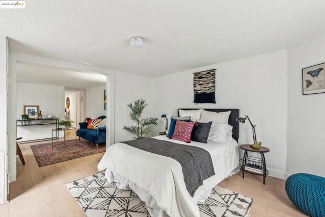 bedroom featuring light hardwood / wood-style floors