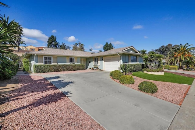 single story home featuring a garage