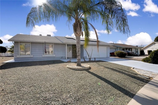 single story home featuring a garage