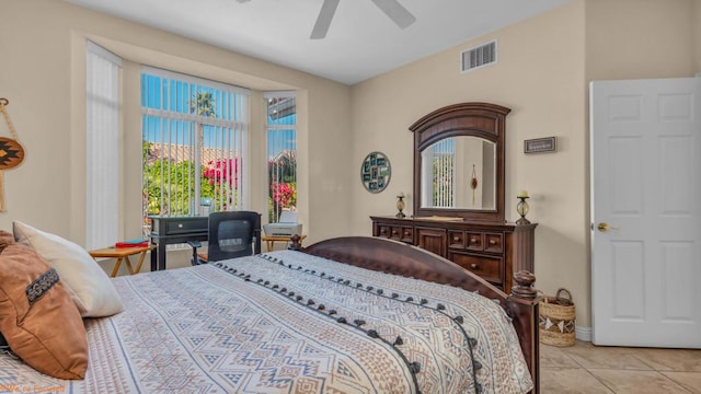 bedroom with light tile patterned flooring and ceiling fan