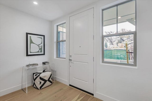 entrance foyer featuring light wood-type flooring