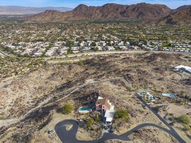 drone / aerial view featuring a mountain view