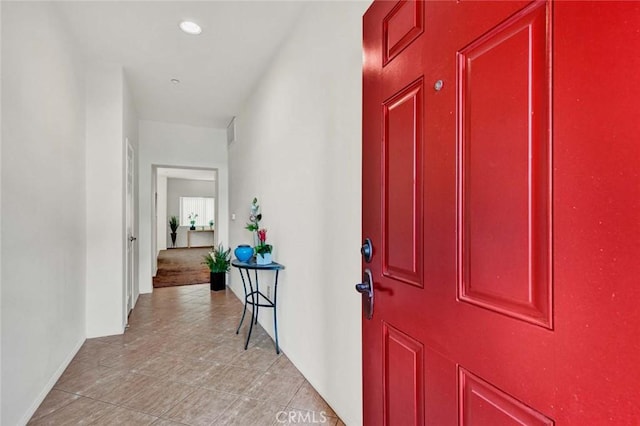 view of tiled foyer entrance