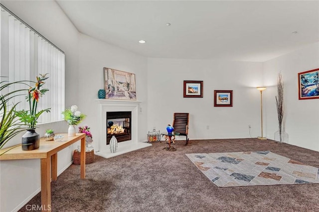 living area with carpet