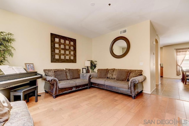 living room with light hardwood / wood-style floors