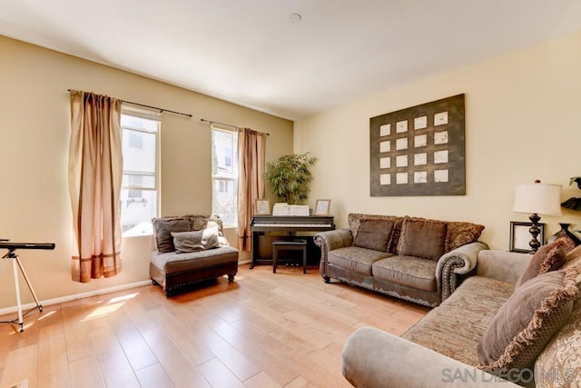 living room with light hardwood / wood-style floors