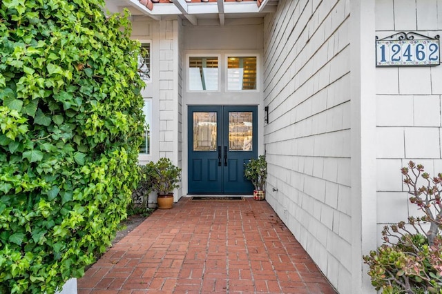 doorway to property featuring french doors