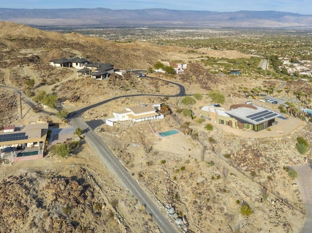 drone / aerial view featuring a mountain view